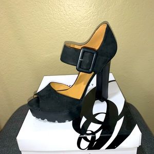 Unique! Suede like material heels. Barely worn.